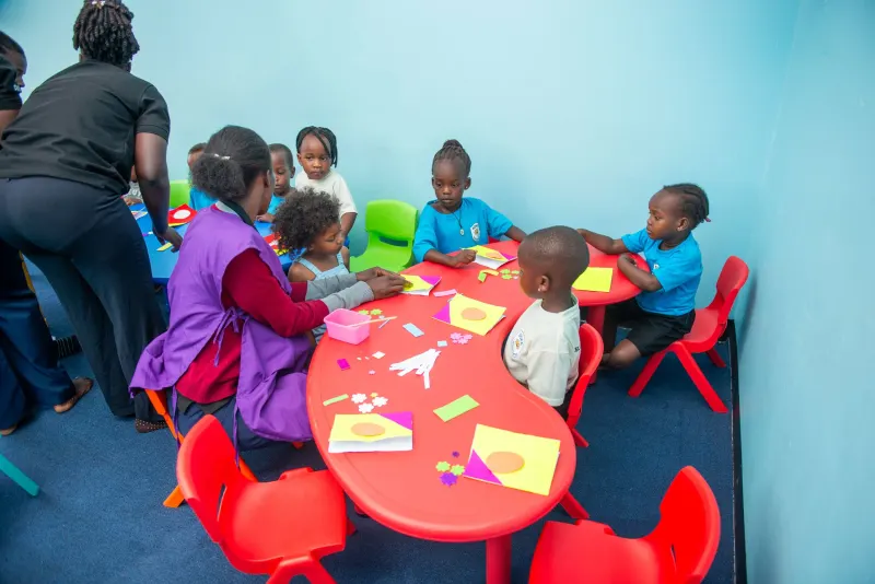 Children taking part in an arts and crafts session at Doxa Kindergarten — photo 2 of 11